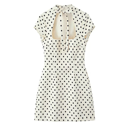 Timeless polka dot mini dress! Cutout neck with bow tie, fitted waist to highlight curves, retro and lively.